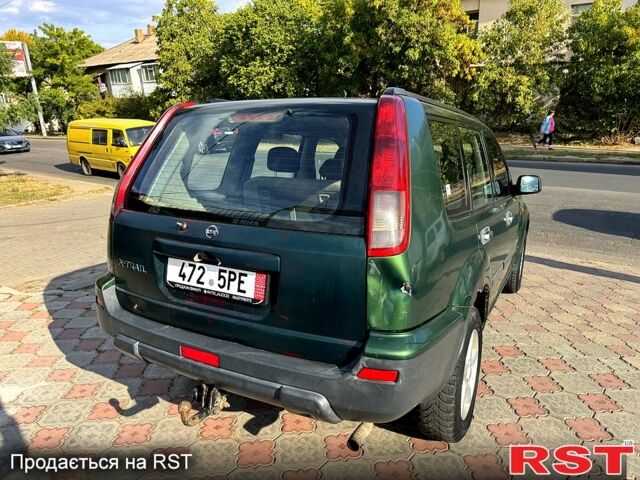 Зеленый Ниссан ИксТрейл, объемом двигателя 2.2 л и пробегом 300 тыс. км за 3199 $, фото 3 на Automoto.ua