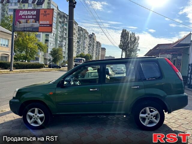 Зеленый Ниссан ИксТрейл, объемом двигателя 2.2 л и пробегом 300 тыс. км за 3199 $, фото 7 на Automoto.ua