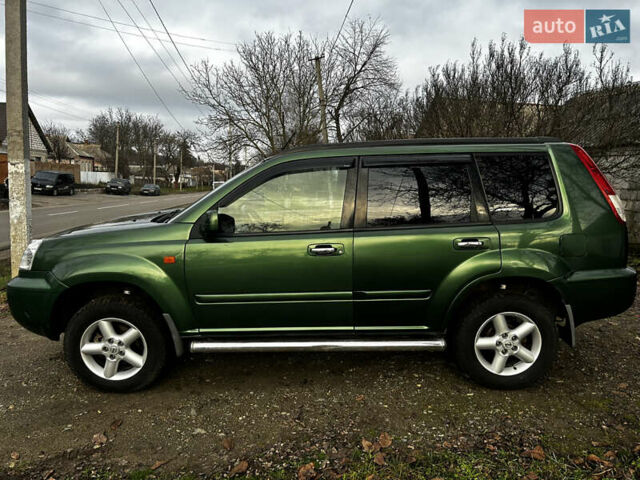 Зеленый Ниссан ИксТрейл, объемом двигателя 2 л и пробегом 308 тыс. км за 5700 $, фото 5 на Automoto.ua