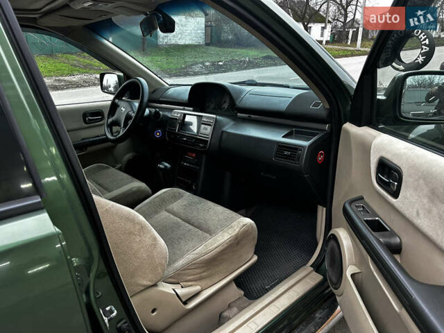 Зеленый Ниссан ИксТрейл, объемом двигателя 2 л и пробегом 308 тыс. км за 5700 $, фото 14 на Automoto.ua