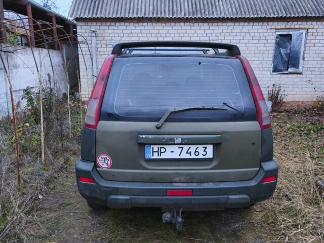 Зеленый Ниссан ИксТрейл, объемом двигателя 2.2 л и пробегом 406 тыс. км за 2135 $, фото 2 на Automoto.ua