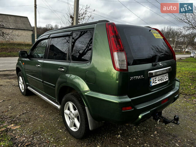 Зеленый Ниссан ИксТрейл, объемом двигателя 2 л и пробегом 308 тыс. км за 5700 $, фото 4 на Automoto.ua