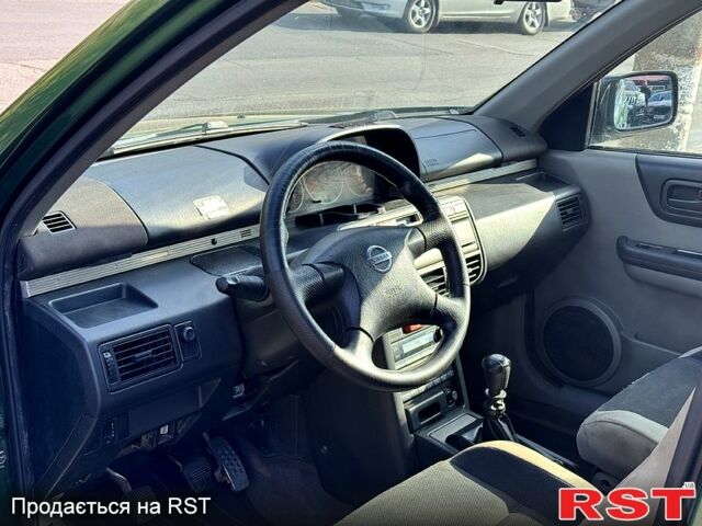 Зеленый Ниссан ИксТрейл, объемом двигателя 2.2 л и пробегом 300 тыс. км за 3199 $, фото 8 на Automoto.ua