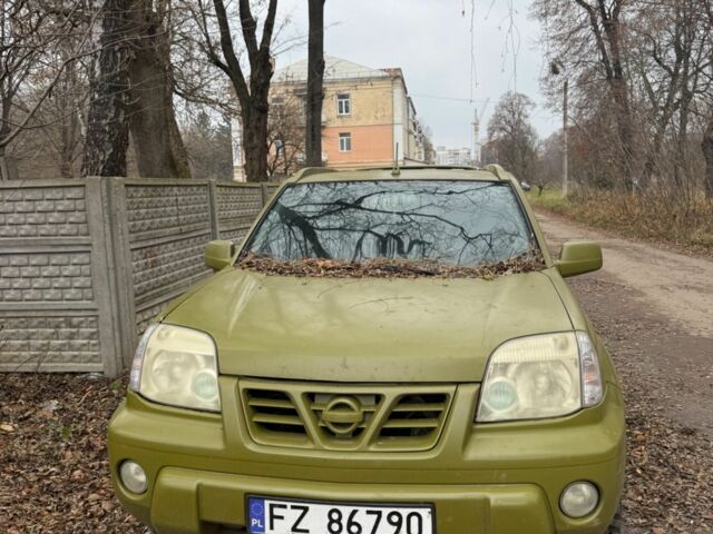 Зеленый Ниссан ИксТрейл, объемом двигателя 2 л и пробегом 280 тыс. км за 1700 $, фото 1 на Automoto.ua