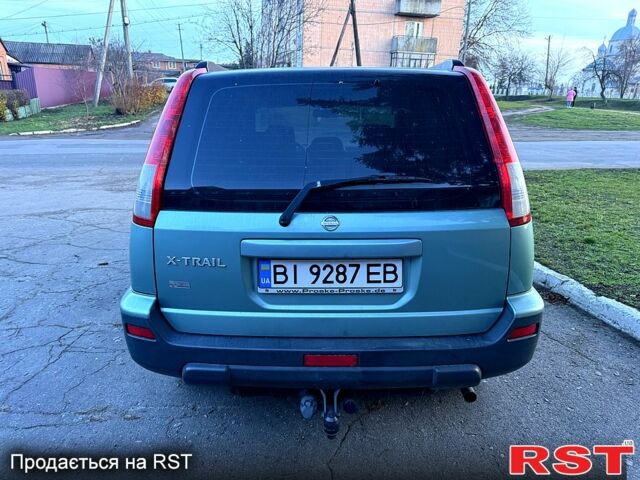 Зелений Ніссан ІксТрейл, об'ємом двигуна 2 л та пробігом 250 тис. км за 6200 $, фото 2 на Automoto.ua
