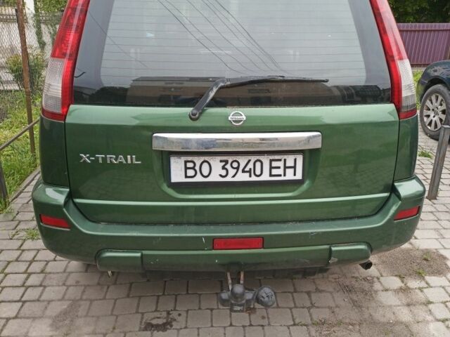 Зеленый Ниссан ИксТрейл, объемом двигателя 2 л и пробегом 350 тыс. км за 4400 $, фото 1 на Automoto.ua