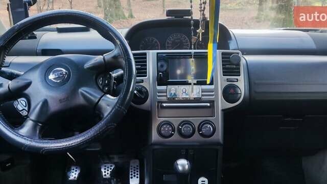 Зелений Ніссан ІксТрейл, об'ємом двигуна 2 л та пробігом 300 тис. км за 5200 $, фото 5 на Automoto.ua