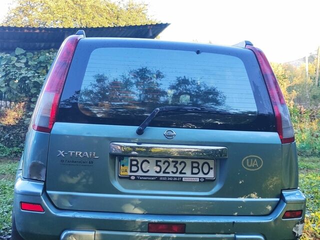 Зелений Ніссан ІксТрейл, об'ємом двигуна 2 л та пробігом 442 тис. км за 5304 $, фото 3 на Automoto.ua