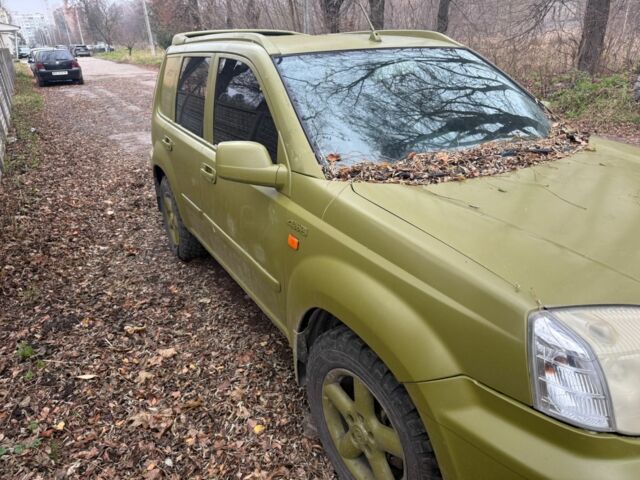 Зеленый Ниссан ИксТрейл, объемом двигателя 2 л и пробегом 280 тыс. км за 1700 $, фото 5 на Automoto.ua