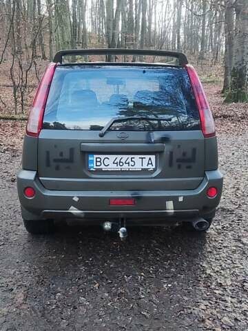 Зелений Ніссан ІксТрейл, об'ємом двигуна 2 л та пробігом 300 тис. км за 5200 $, фото 1 на Automoto.ua