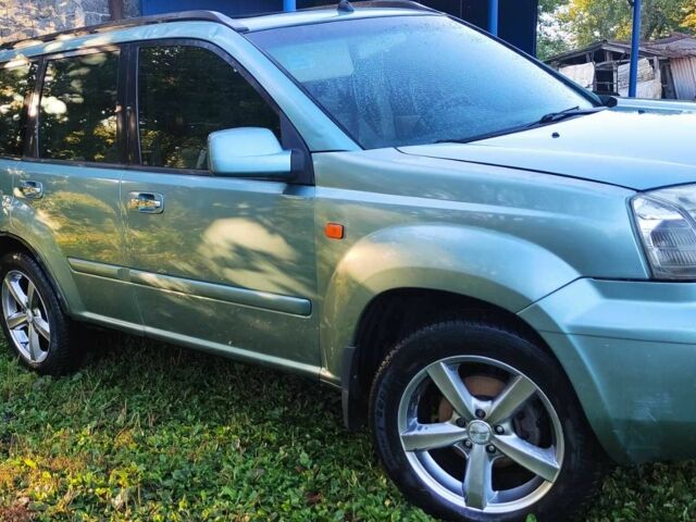 Зелений Ніссан ІксТрейл, об'ємом двигуна 2 л та пробігом 442 тис. км за 5304 $, фото 2 на Automoto.ua