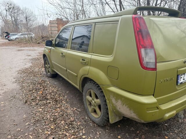 Зеленый Ниссан ИксТрейл, объемом двигателя 2 л и пробегом 280 тыс. км за 1700 $, фото 7 на Automoto.ua