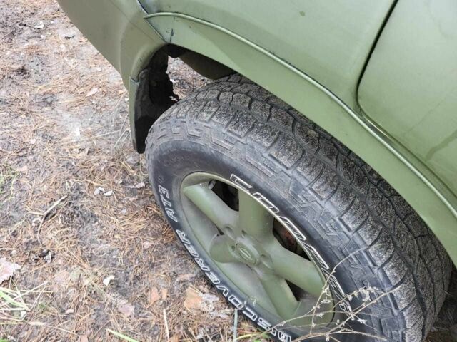 Зеленый Ниссан ИксТрейл, объемом двигателя 2.2 л и пробегом 236 тыс. км за 3096 $, фото 4 на Automoto.ua