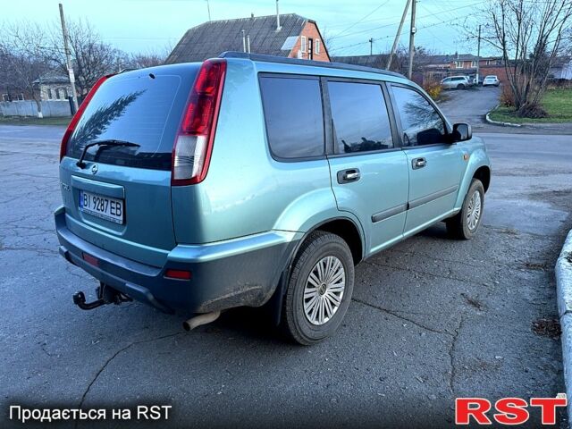 Зелений Ніссан ІксТрейл, об'ємом двигуна 2 л та пробігом 250 тис. км за 6200 $, фото 3 на Automoto.ua