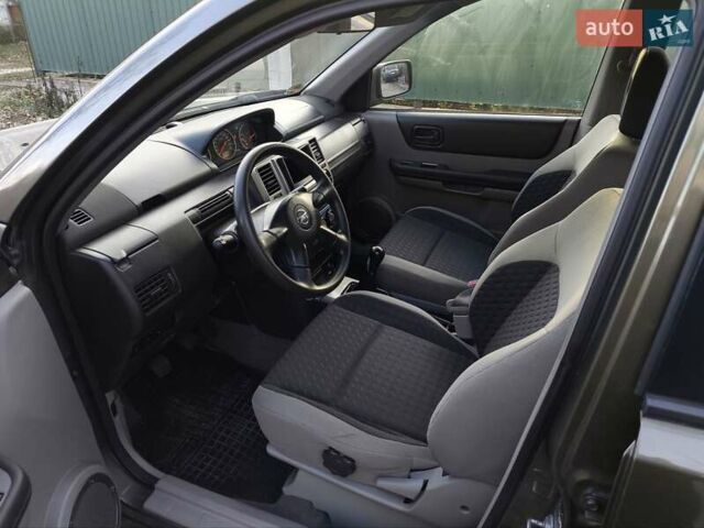 Зеленый Ниссан ИксТрейл, объемом двигателя 2 л и пробегом 145 тыс. км за 7250 $, фото 17 на Automoto.ua