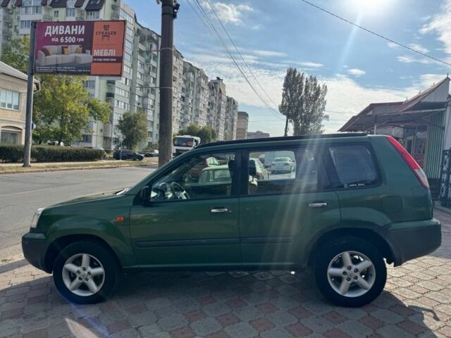 Зеленый Ниссан ИксТрейл, объемом двигателя 2.2 л и пробегом 300 тыс. км за 2999 $, фото 6 на Automoto.ua