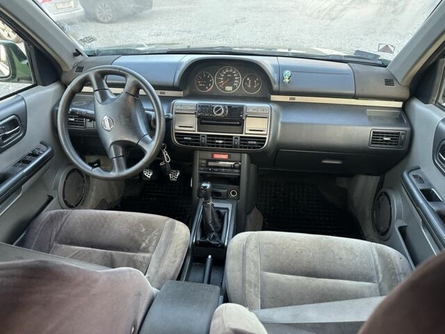 Зеленый Ниссан ИксТрейл, объемом двигателя 2.2 л и пробегом 222 тыс. км за 3350 $, фото 11 на Automoto.ua