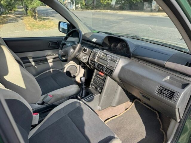 Зеленый Ниссан ИксТрейл, объемом двигателя 2.2 л и пробегом 300 тыс. км за 2999 $, фото 9 на Automoto.ua