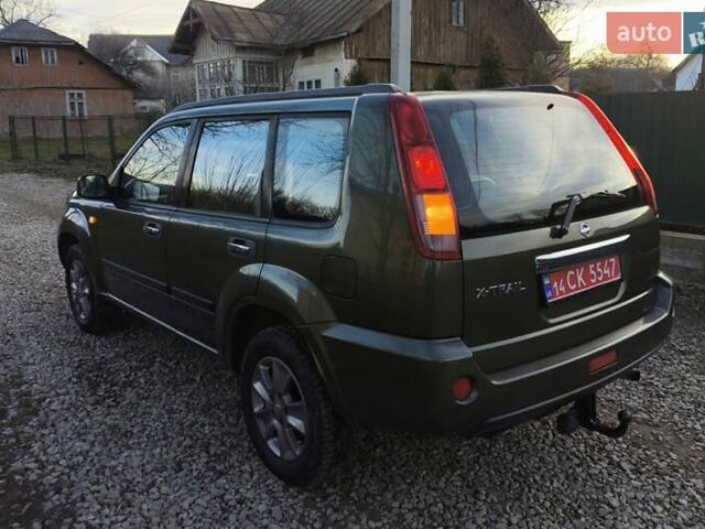 Зеленый Ниссан ИксТрейл, объемом двигателя 2 л и пробегом 145 тыс. км за 7250 $, фото 5 на Automoto.ua