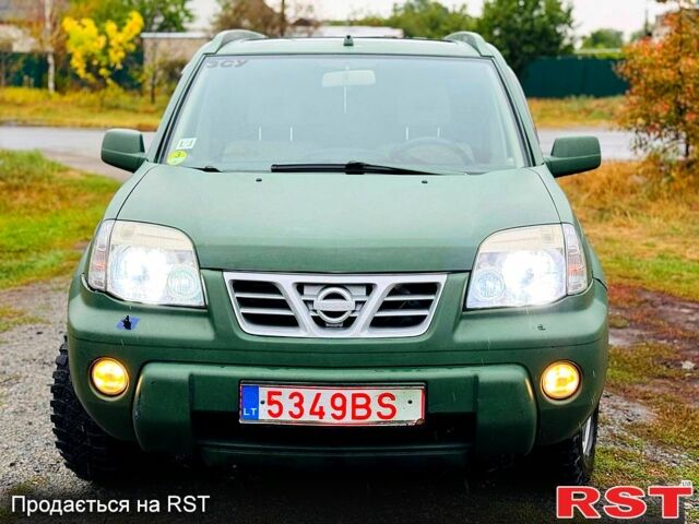 Зеленый Ниссан ИксТрейл, объемом двигателя 2.2 л и пробегом 330 тыс. км за 3250 $, фото 1 на Automoto.ua
