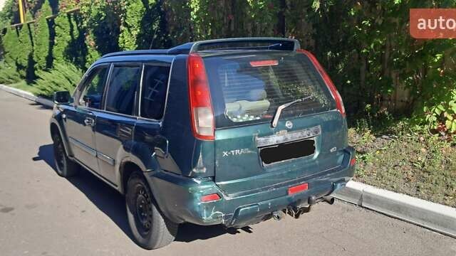 Зеленый Ниссан ИксТрейл, объемом двигателя 2.5 л и пробегом 309 тыс. км за 4842 $, фото 1 на Automoto.ua