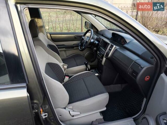 Зеленый Ниссан ИксТрейл, объемом двигателя 2 л и пробегом 145 тыс. км за 7250 $, фото 12 на Automoto.ua