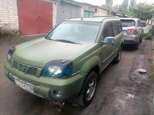 Зеленый Ниссан ИксТрейл, объемом двигателя 2 л и пробегом 300 тыс. км за 2450 $, фото 1 на Automoto.ua