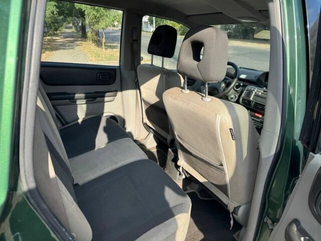 Зеленый Ниссан ИксТрейл, объемом двигателя 2.2 л и пробегом 300 тыс. км за 2999 $, фото 12 на Automoto.ua