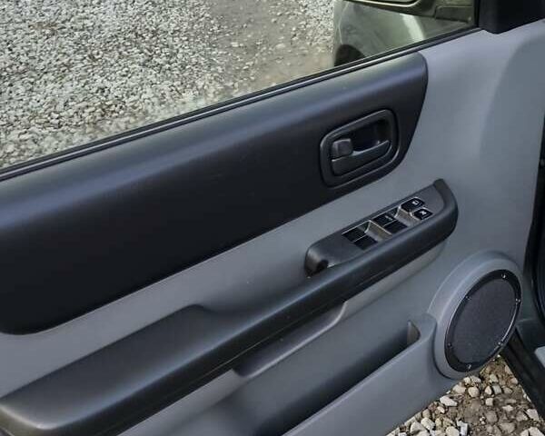 Зеленый Ниссан ИксТрейл, объемом двигателя 2 л и пробегом 145 тыс. км за 7250 $, фото 20 на Automoto.ua