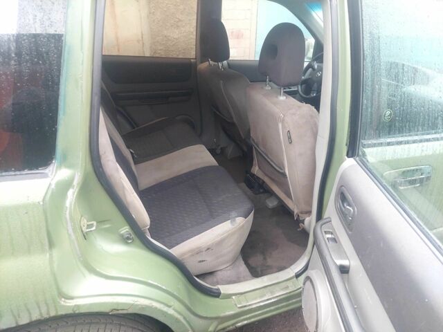 Зеленый Ниссан ИксТрейл, объемом двигателя 2 л и пробегом 300 тыс. км за 2450 $, фото 4 на Automoto.ua