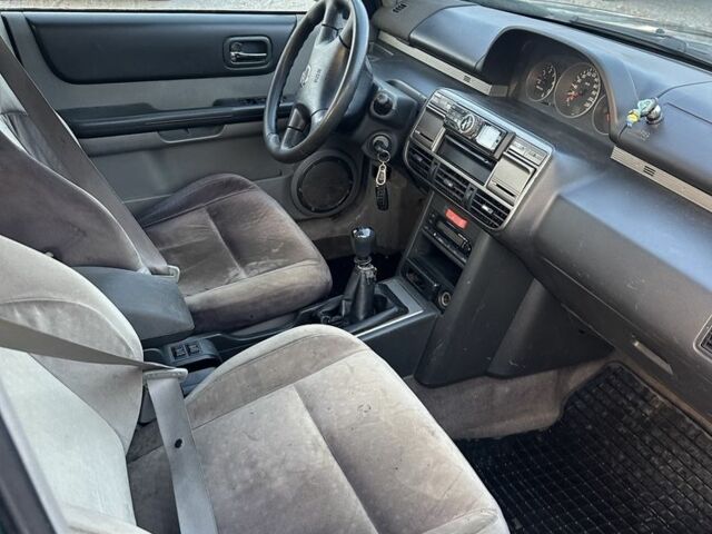 Зеленый Ниссан ИксТрейл, объемом двигателя 2.2 л и пробегом 222 тыс. км за 3350 $, фото 10 на Automoto.ua