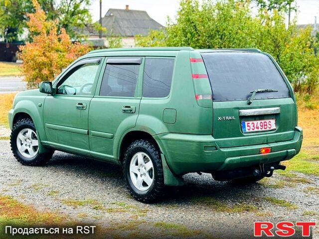 Зеленый Ниссан ИксТрейл, объемом двигателя 2.2 л и пробегом 330 тыс. км за 3250 $, фото 2 на Automoto.ua