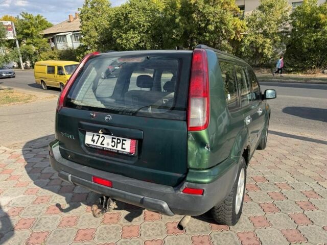 Зеленый Ниссан ИксТрейл, объемом двигателя 2.2 л и пробегом 300 тыс. км за 2999 $, фото 3 на Automoto.ua