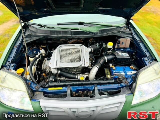 Зеленый Ниссан ИксТрейл, объемом двигателя 2.2 л и пробегом 330 тыс. км за 3250 $, фото 4 на Automoto.ua