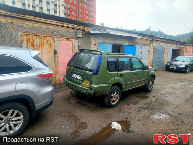 Зеленый Ниссан ИксТрейл, объемом двигателя 2.2 л и пробегом 320 тыс. км за 2450 $, фото 3 на Automoto.ua