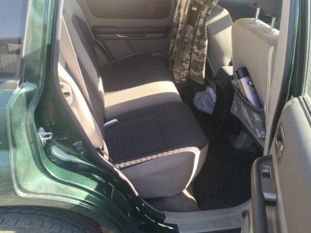 Зеленый Ниссан ИксТрейл, объемом двигателя 2.2 л и пробегом 210 тыс. км за 4200 $, фото 4 на Automoto.ua