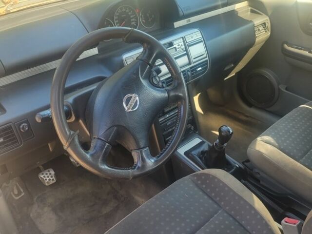 Зеленый Ниссан ИксТрейл, объемом двигателя 2 л и пробегом 230 тыс. км за 3350 $, фото 2 на Automoto.ua