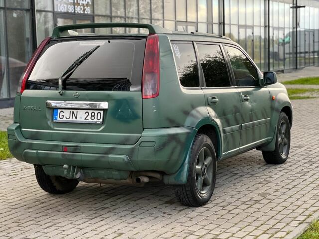 Зеленый Ниссан ИксТрейл, объемом двигателя 2.2 л и пробегом 290 тыс. км за 2950 $, фото 3 на Automoto.ua