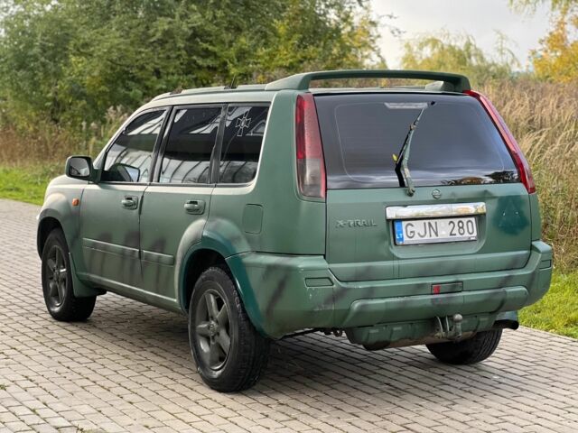 Зеленый Ниссан ИксТрейл, объемом двигателя 2.2 л и пробегом 290 тыс. км за 2950 $, фото 5 на Automoto.ua