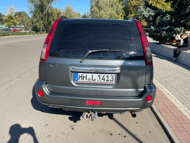 Зеленый Ниссан ИксТрейл, объемом двигателя 2.2 л и пробегом 174 тыс. км за 4246 $, фото 4 на Automoto.ua