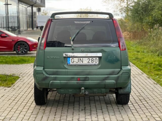 Зеленый Ниссан ИксТрейл, объемом двигателя 2.2 л и пробегом 290 тыс. км за 2950 $, фото 4 на Automoto.ua