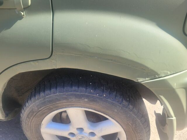 Зеленый Ниссан ИксТрейл, объемом двигателя 2 л и пробегом 230 тыс. км за 3350 $, фото 1 на Automoto.ua