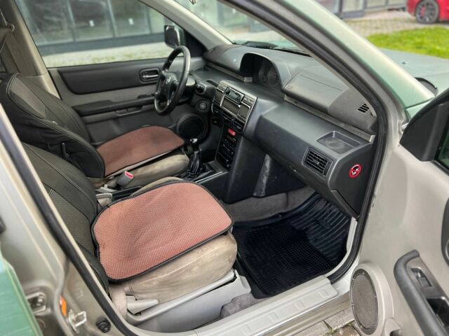 Зеленый Ниссан ИксТрейл, объемом двигателя 2.2 л и пробегом 290 тыс. км за 2950 $, фото 7 на Automoto.ua