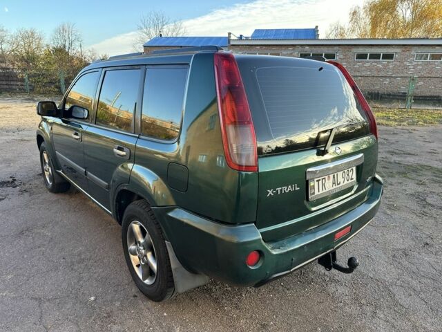 Зеленый Ниссан ИксТрейл, объемом двигателя 2.2 л и пробегом 394 тыс. км за 4700 $, фото 4 на Automoto.ua