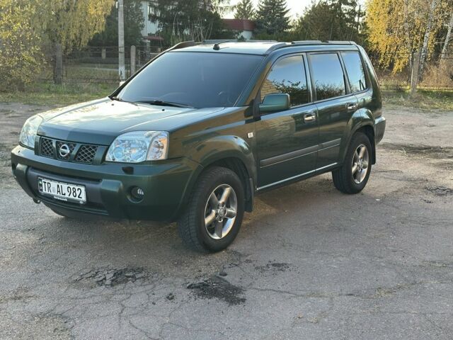 Зеленый Ниссан ИксТрейл, объемом двигателя 2.2 л и пробегом 394 тыс. км за 4700 $, фото 2 на Automoto.ua