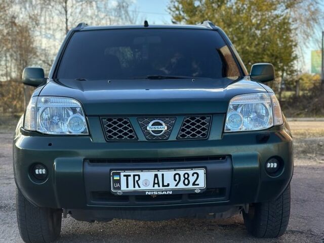 Зеленый Ниссан ИксТрейл, объемом двигателя 2.2 л и пробегом 394 тыс. км за 4700 $, фото 1 на Automoto.ua