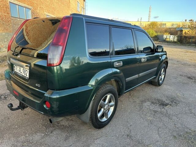 Зеленый Ниссан ИксТрейл, объемом двигателя 2.2 л и пробегом 394 тыс. км за 4700 $, фото 6 на Automoto.ua