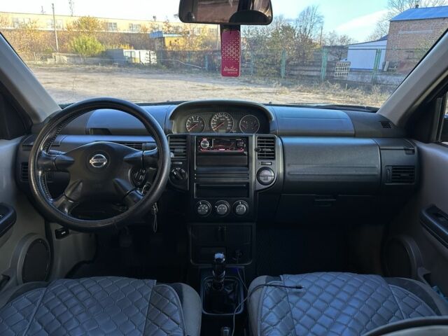 Зеленый Ниссан ИксТрейл, объемом двигателя 2.2 л и пробегом 394 тыс. км за 4700 $, фото 15 на Automoto.ua