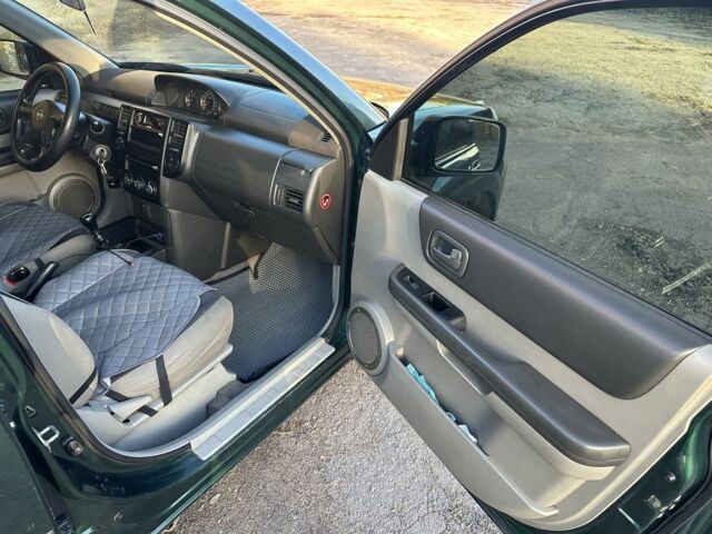 Зеленый Ниссан ИксТрейл, объемом двигателя 2.2 л и пробегом 394 тыс. км за 4700 $, фото 14 на Automoto.ua