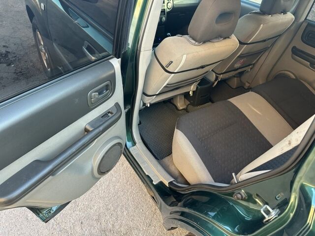 Зеленый Ниссан ИксТрейл, объемом двигателя 2.2 л и пробегом 394 тыс. км за 4700 $, фото 10 на Automoto.ua